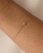 14K Gold Wilder Birthstone Bracelet - White Topaz - April worn on wrist