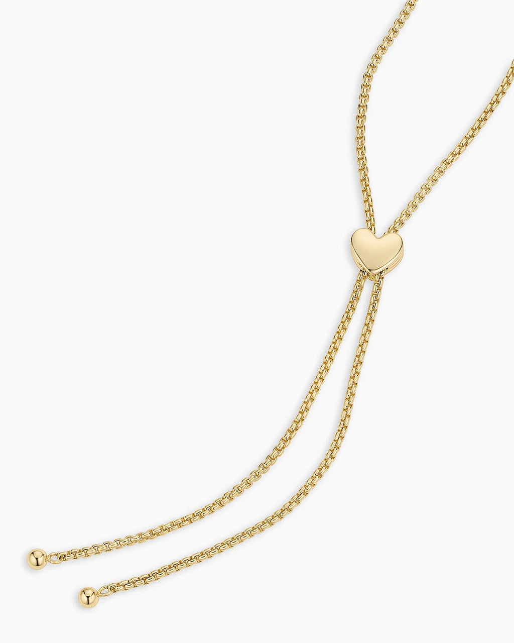 Gold heart slider and chain detail