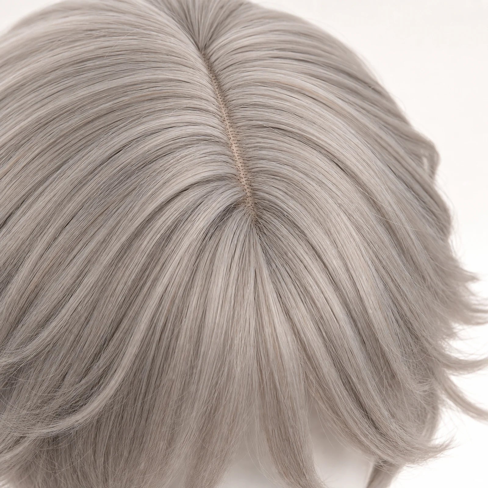 Close-up of CosNova ash gray heat-resistant synthetic wig fiber and center parting