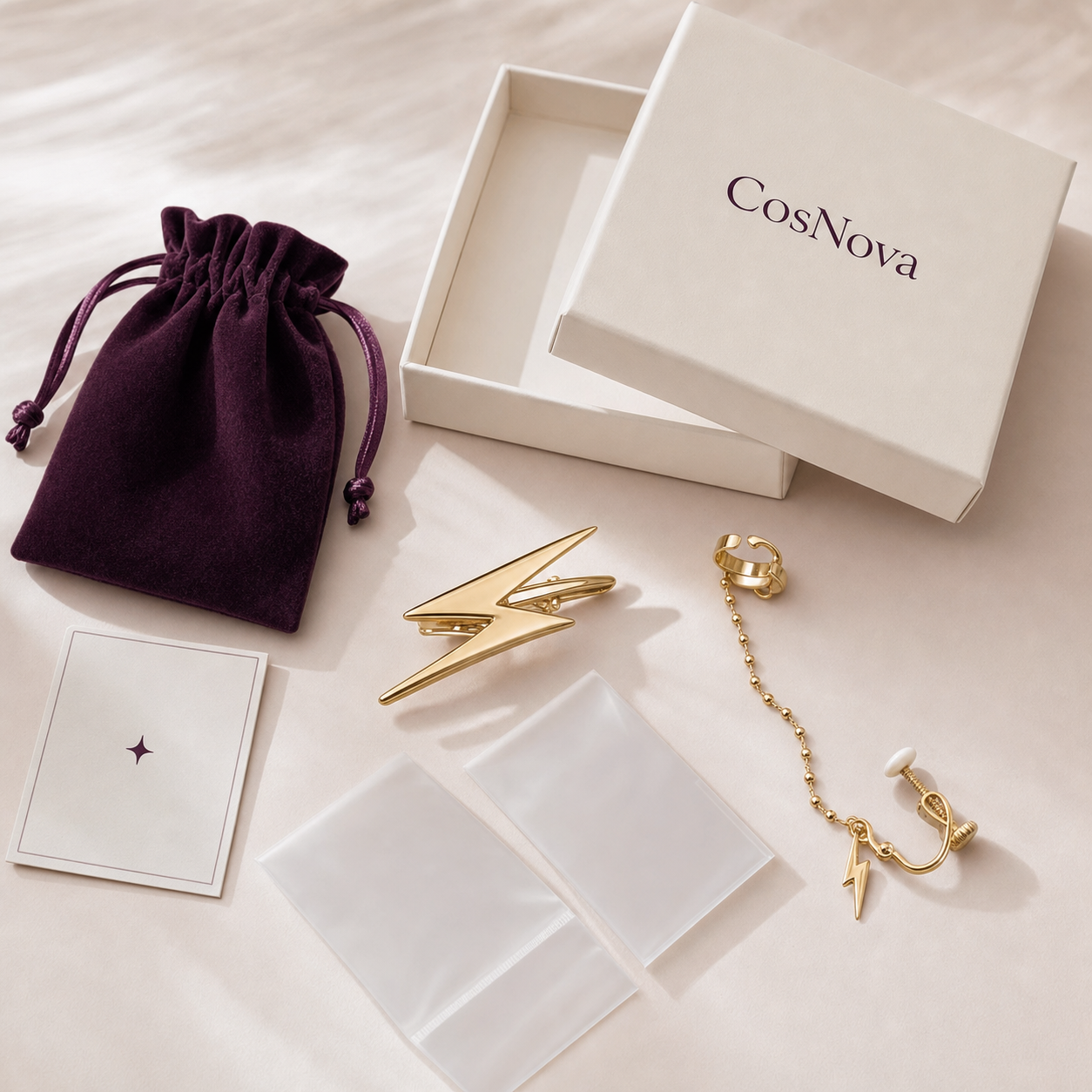CosNova gold lightning hair clip and ear cuff set with sleeves pouch care card and box