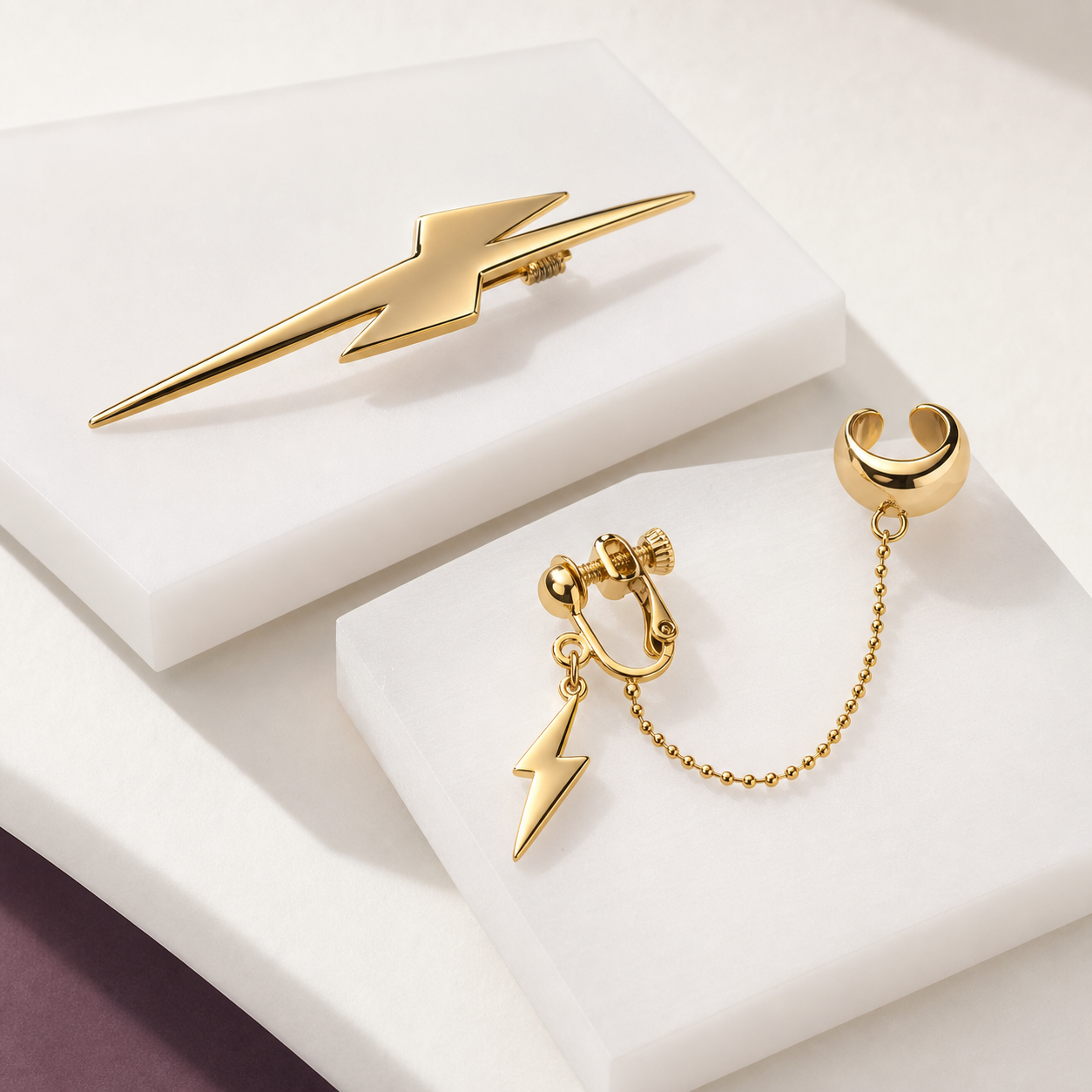 CosNova two-piece gold lightning hair clip and non-pierced chain ear cuff set
