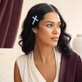 CosNova light cyan translucent cross hair clip worn in an adult model's side hairstyle