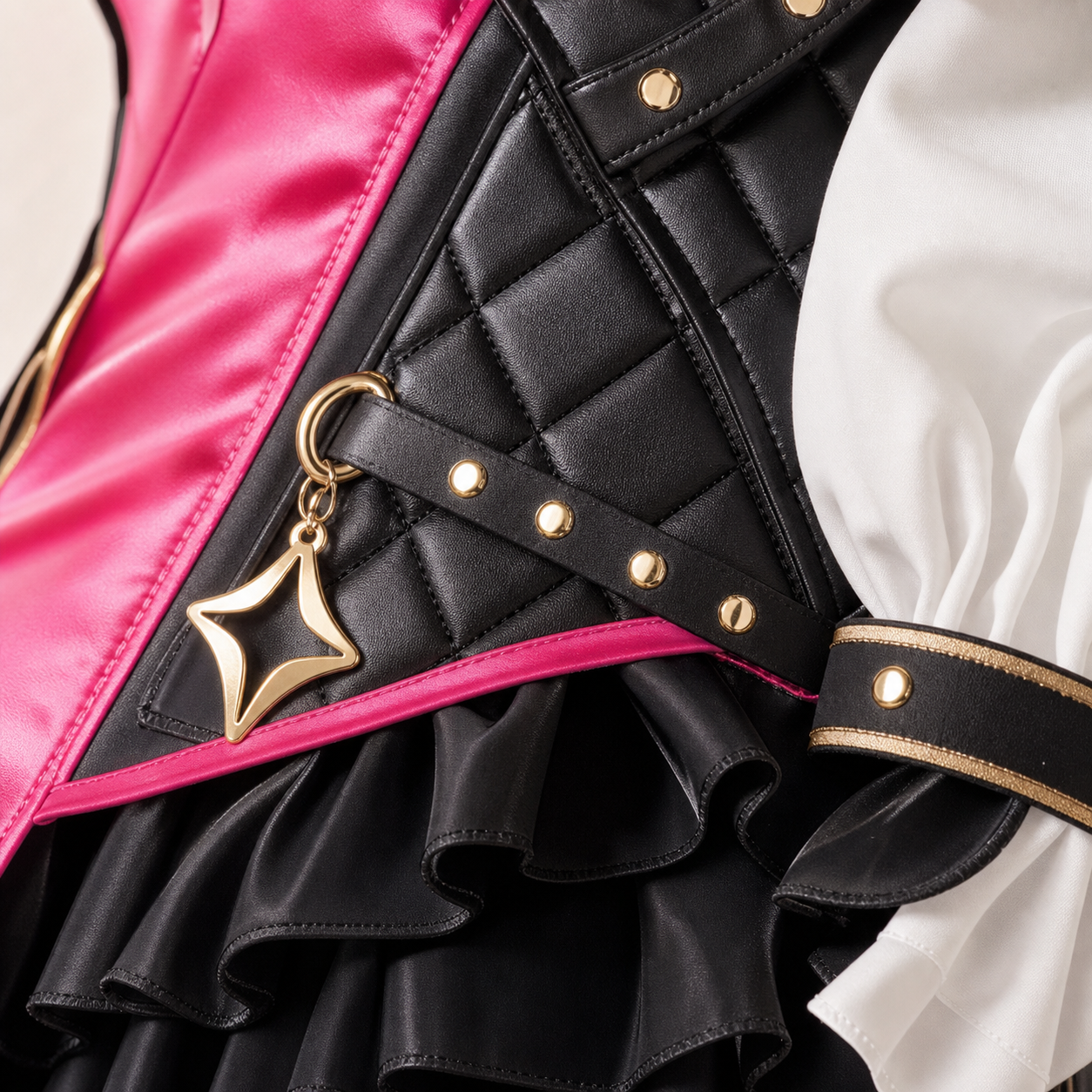 Macro detail of CosNova pink black cosplay costume faux leather look stitching and gold accents