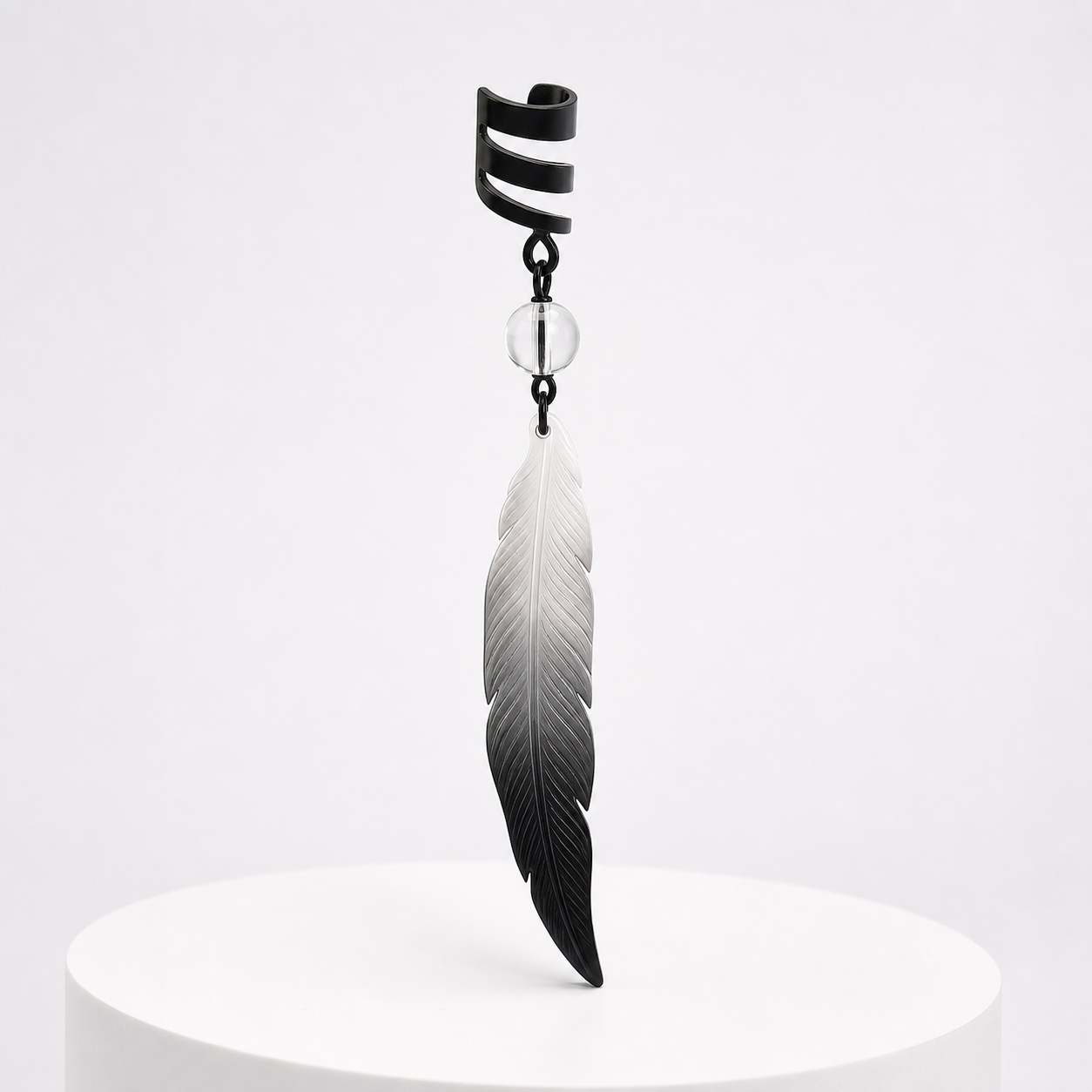 CosNova non-pierced feather ear cuff with black spiral clamp clear bead and white-to-black resin pendant