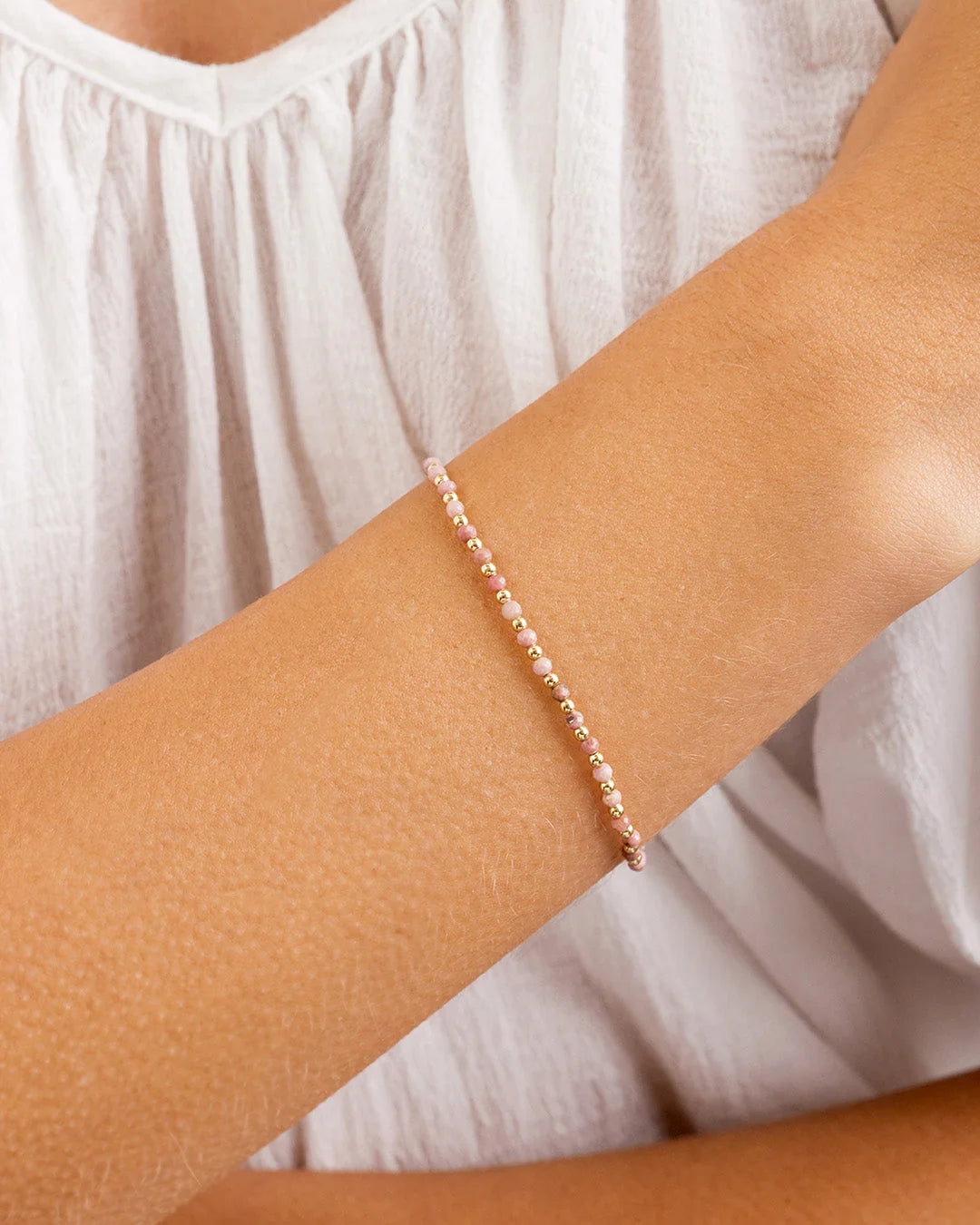 Natural Gemstone Beaded Bracelet - Rhodochrosite - Compassion worn on wrist