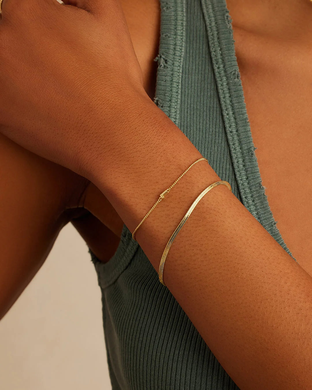 Wilder Mini Alphabet Bracelet - L worn in 18K Gold Plated